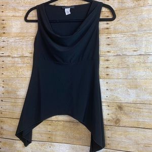 American city wear black blouse as.    S.